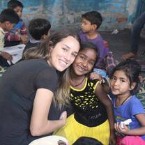 Volunteer teaching kids in Delhi