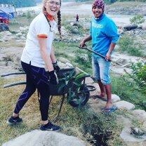 Tree planing in action. The team planting trees to restore the local environment.
