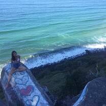 This photo was taken at Cock Rock in Burleigh Heads in Gold Coast Australia. It is a rock formation that juts out of the side of cliff and provides an amazing view of the Gold Coast coastline. 