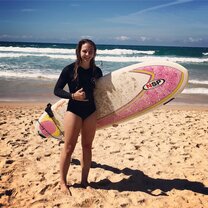 Spending my weekends at the beach surfing.