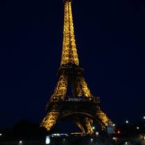 This photo was taken from a boat on the Seine, we'd gone on a river tour and as the trip ended and we came around the bend we saw the Eiffel tower all lit up.