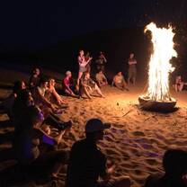 Sitting by the bonfire on the Silk Road Excursion.