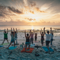 Sunrise yoga on the beach