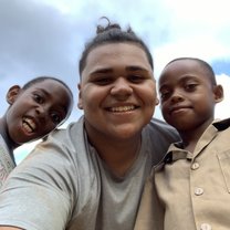 In this photo, it was two of the students from Mt Olivet primary school. They wanted to take a photo with me after i had taught them how to play some baseball. 