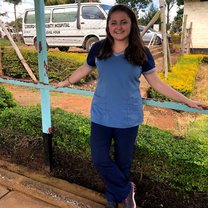 Ashley, a volunteer outside of the county hospital