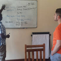 Program coordinator conducting an orientation training session with intern