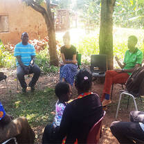 An organized community development project training session with the intern