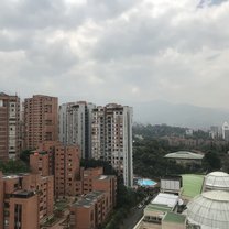 View of my apartment block, the pool, and Santa Fé mall