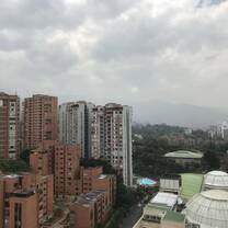 View of my apartment block, the pool, and Santa Fé mall