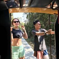 Hanging off the taxi