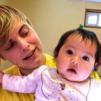 Christian and Baby Volunteer Christian with Child