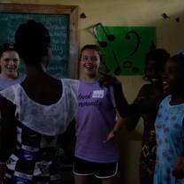 Summer Camp Volunteers teaching our students songs in English!