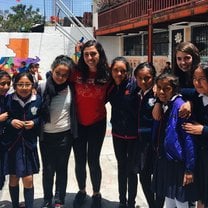 Taking photos with a few of my students on our last day of volunteering! 