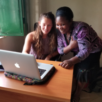 Working with FCDE Community Program Volunteer, Juliet Muhindo, in the FCDE office