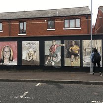 Murals on one of the peace walls in Belfast