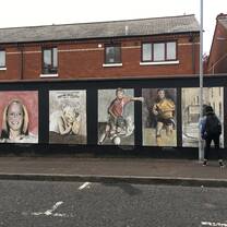 Murals on one of the peace walls in Belfast