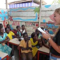 Angelina, volunteer teacher taking part in her class