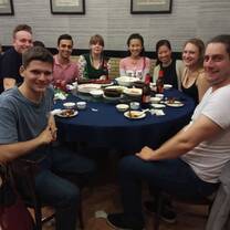 group around a table studying