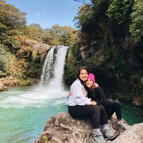 Francesca and Charlotte at a waterfall