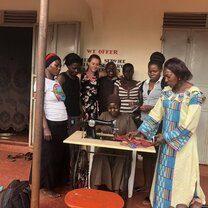 My community and their new sewing machine.