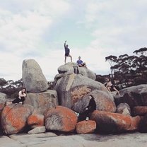 Group picture posing at Bay of Fires in Tasmania 