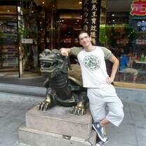 Me standing next to a Tortoise Sculpture, China, 2012.