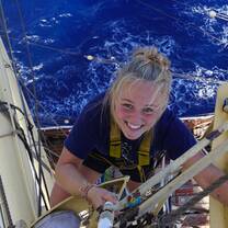 A+ World Academy student climbing aloft 