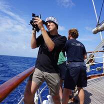 A+ World Academy students learning sailing techniques and theory