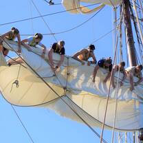 A+ World Academy students hoisting sails