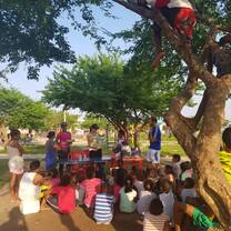 Reading educational, values-based stories to youth in a community of refugees and displaced peoples. 