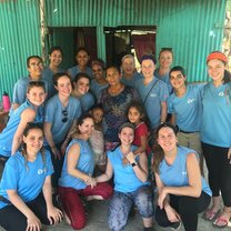 This is a group picture of all of us on the trip on the island with the sweet family that cooked for us after our work every day!