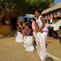 Volunteers worked alongside local leaders to organize a youth games competition at a community organization 