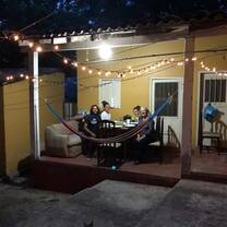 We have a second outdoor kitchen and giant, shaded courtyard at the Volunteer House.