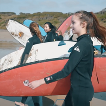 girls going surfing