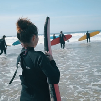 girls going surfing
