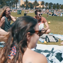 group on grassy hill
