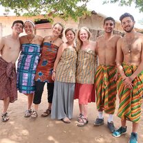 Ghana getting in traditional dress before we meet a local Ghanain witch doctor..