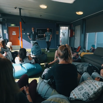 people in a dark room 