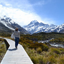 A student hiking in Aoraki/Mount Cook National Park's Hooker Valley Track