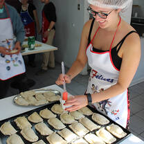 A student making Chilean empanadas