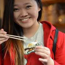 A student eating sushi