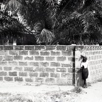 taken with film of a girl playing hide in go seek in the village
