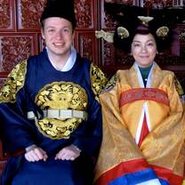 American intern and host dressed in traditional Korean clothes