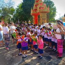 One objective of children development is to improve social and cultural skills for children. Participation in the religious ceremony is to achieve such kind of development.