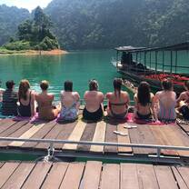 Tour group sitting on the dock at Khao Sok National Parn