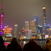shanghai skyline with people from the program