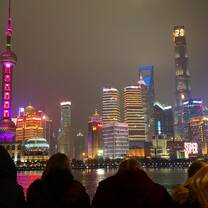 shanghai skyline with people from the program