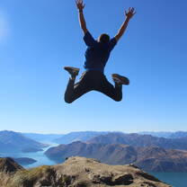 Jumping in the air on Roy’s Peak