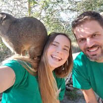 Volunteers with a dassie
