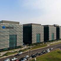 Khalifa University Main campus, large and modern structures surrounded by landscaped green in the heart of Abu dhabi